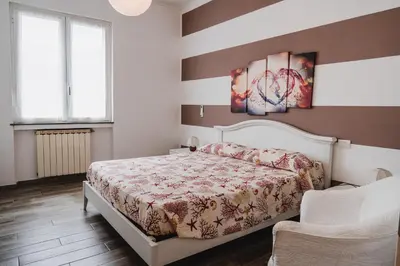 Letto o letti in una camera di House Of Alex
