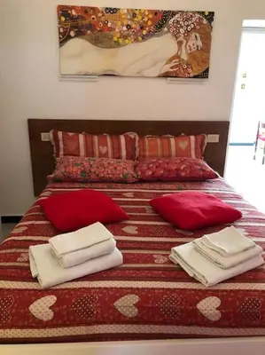 Letto o letti in una camera di Beatrice Nel centro di Levanto