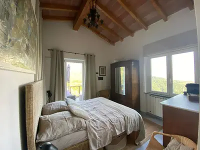 Letto o letti in una camera di Torre Rossa