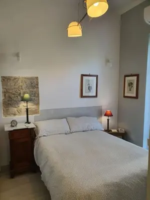 Letto o letti in una camera di Casa del Golfo