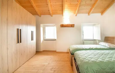 Letto o letti in una camera di Cozy Home In Tribogna With Wifi