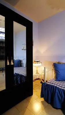 Letto o letti in una camera di La casina dei cuori di nonna Miglia