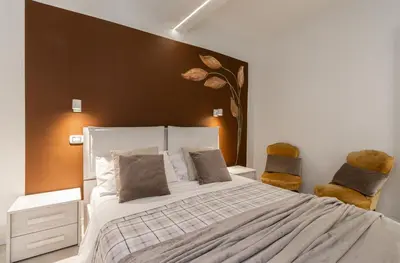 Letto o letti in una camera di Suite Pomposa 28 - Affitti Brevi Italia