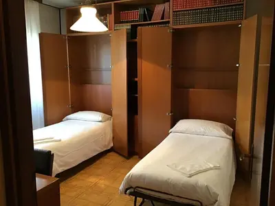 Letto o letti in una camera di Le Torri