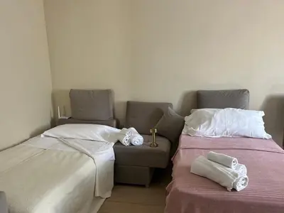 Letto o letti in una camera di Pizzighettone Residenza La Corte