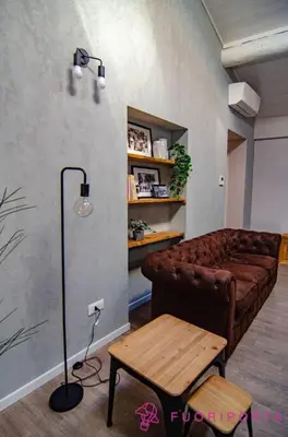 Area soggiorno di FuoriPorta Affitti Brevi - Corte 2 con parcheggio gratuito