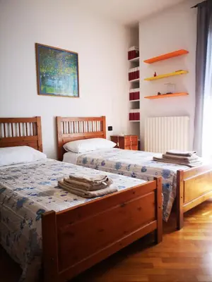 Letto o letti in una camera di SUITE TRAVEL HOME