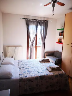 Letto o letti in una camera di SUITE TRAVEL HOME
