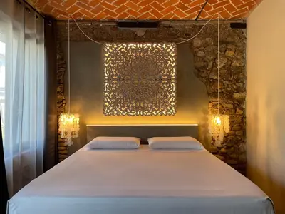 Letto o letti in una camera di DeLax B&B - adults only