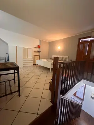 Letto o letti in una camera di casa nonna Rica