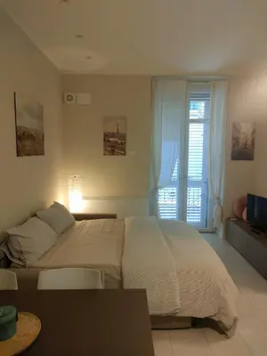 Letto o letti in una camera di Residenza Il principe, Bilocale 2 in centro