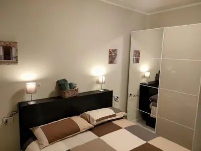 Letto o letti in una camera di Residenza Il principe, Bilocale 2 in centro