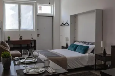 Letto o letti in una camera di Sleepn‘joy Pavia