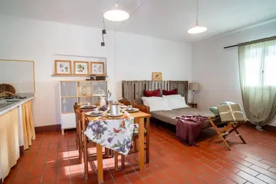 Letto o letti in una camera di Agriturismo Il Monticello
