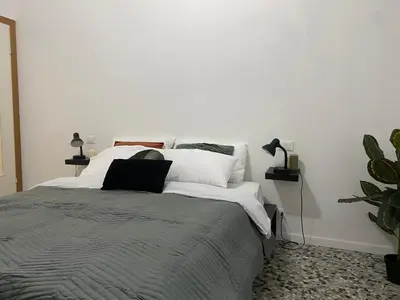 Letto o letti in una camera di Short Stay Pavia nuovo in città