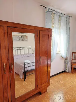 Letto o letti in una camera di La Casetta di Quercia