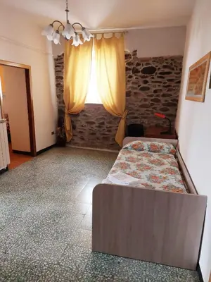 Letto o letti in una camera di La Casetta di Quercia
