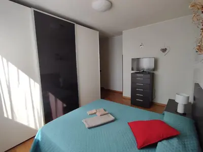 Letto o letti in una camera di Residenza tra Parma e Fiere