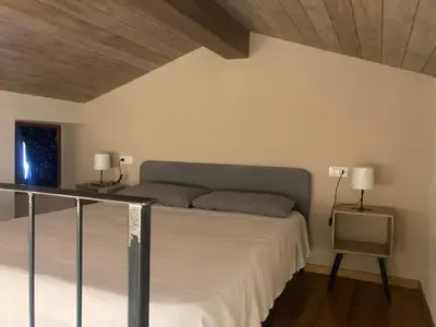 Letto o letti in una camera di L'angolo nascosto