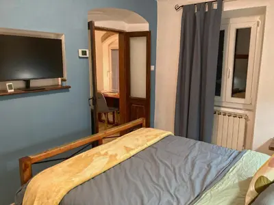Letto o letti in una camera di La Casa Rossa Arcola Con Vista