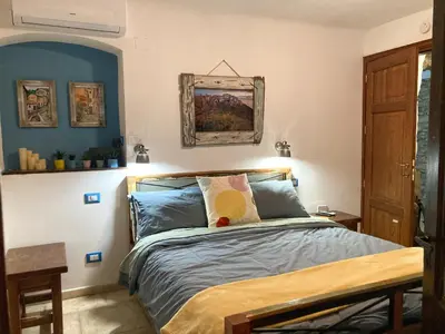 Letto o letti in una camera di La Casa Rossa Arcola Con Vista