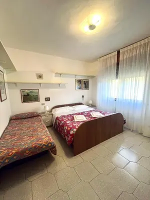 Letto o letti in una camera di Appartamenti nei pressi della stazione