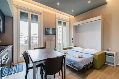 Letto o letti in una camera di Pavia Tower - by Host4U