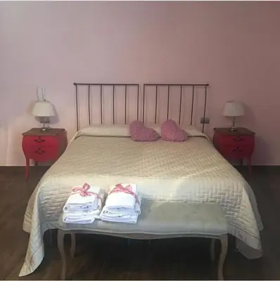 Letto o letti in una camera di B&B BuongiornoNotte