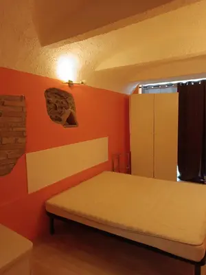 Letto o letti in una camera di APPARTAMENTO CHECK iN