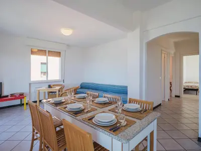 Area soggiorno di Apartment Come il sole all'improvviso by Interhome