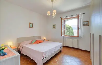 Letto o letti in una camera di 2 Bedroom Lovely Apartment In Cembrano