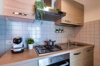 Cucina o angolo cottura di OSPEDALI e UNIVERSITÀ - Policlinico San Matteo a 300m - Parcheggio GRATIS