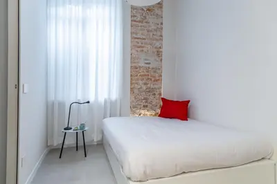 Letto o letti in una camera di VickyLù - City Center - by Host4U