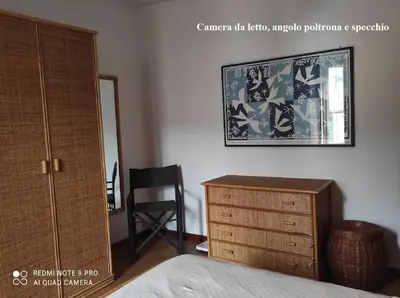 Letto o letti in una camera di Appartamento trilo fronte Parco con parking e uso bici gratis Check out h18