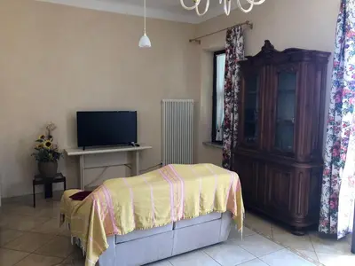 TV o dispositivi per l'intrattenimento presso Appartamento Via Rezzano vista mare