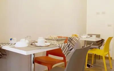 Area soggiorno di Minerva Rooms