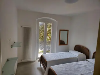 Letto o letti in una camera di Casa Anelita