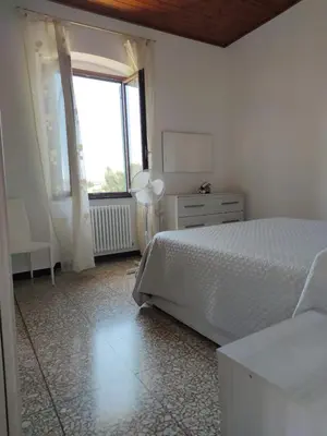 Letto o letti in una camera di La casa tra verde e mare