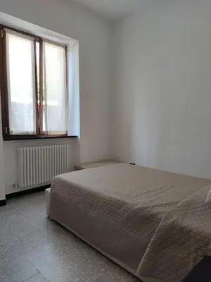 Letto o letti in una camera di La casa tra verde e mare