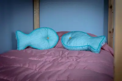 Letto o letti in una camera di B&B LA MIMOSA E IL GELSOMINO