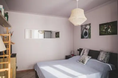 Letto o letti in una camera di B&B LA MIMOSA E IL GELSOMINO