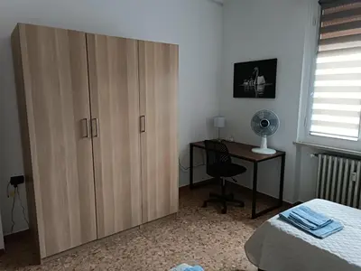 Letto o letti in una camera di Casa Fiume