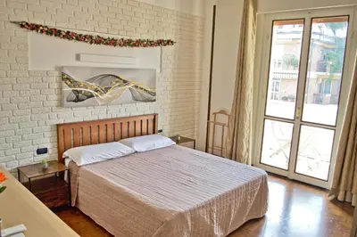 Letto o letti in una camera di Casa Fiume