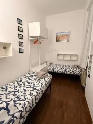 Letto o letti in una camera di Casa Ilaria