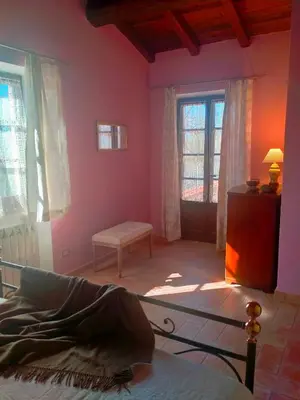 Letto o letti in una camera di Ca'di Picarasco