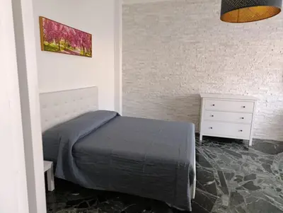Letto o letti in una camera di La perla