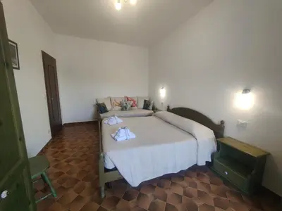 Letto o letti in una camera di Il Giardino dei Pavoni