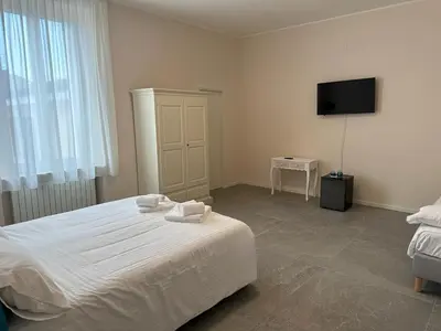Letto o letti in una camera di Hotel Il Duca barbablu