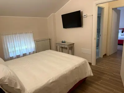 Letto o letti in una camera di Hotel Il Duca barbablu