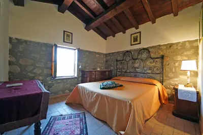 Letto o letti in una camera di Villa Le Due Lune 6 Pax by VILLASRETREATS
